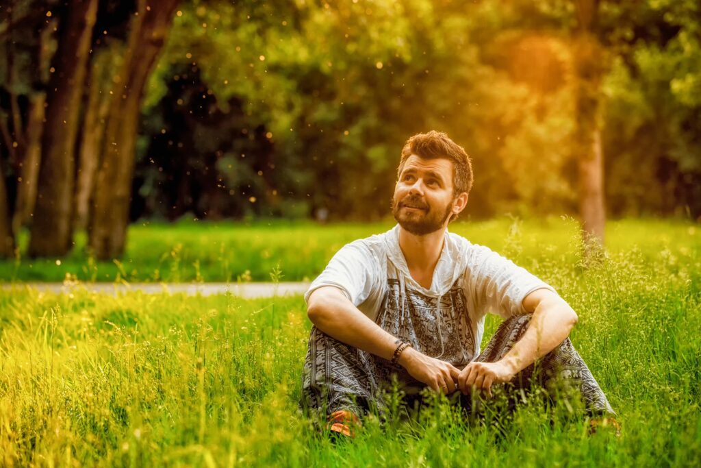 man relaxing in the grass