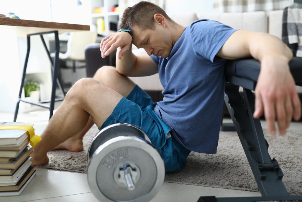 man struggling to exercise