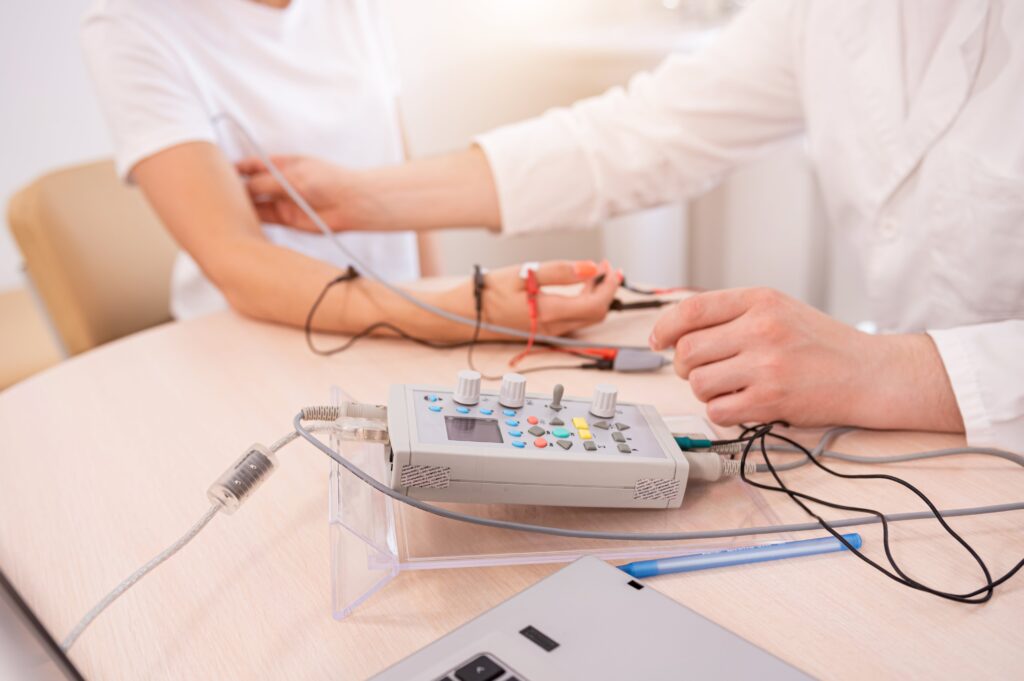 Patient nerves testing using electromyography at medical center