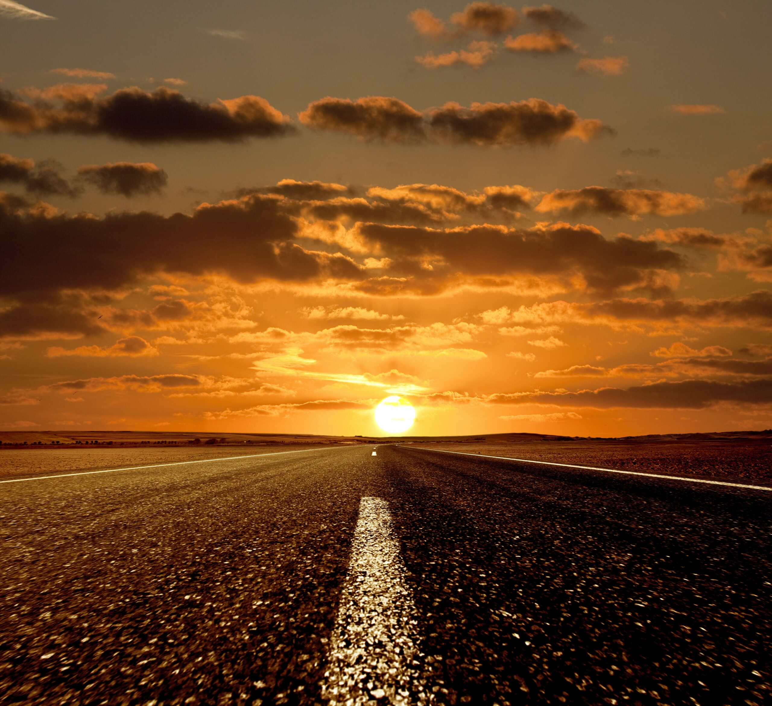 Road ahead and the sunset