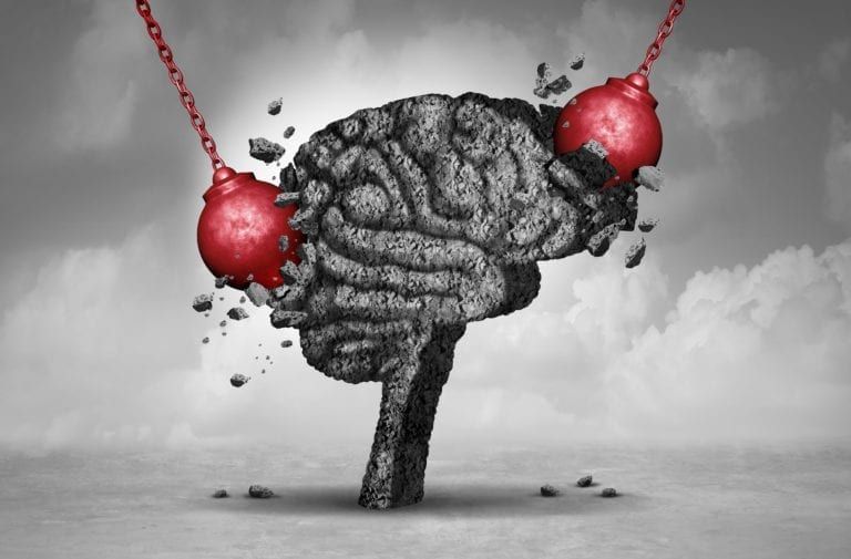 headache concept. brain being hit by wrecking balls
