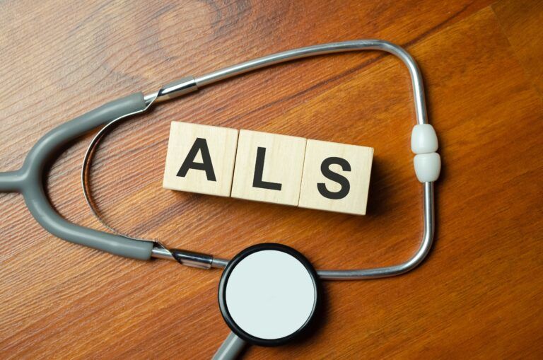 the acronym als for Amyotrophic Lateral Sclerosis concept represented by wooden letter